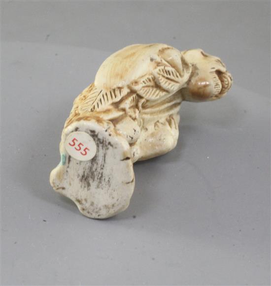 A Japanese porcelain netsuke a Sennin, 19th century, 5.3cm (no. 555)